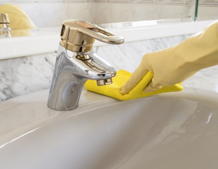 Cleaning process in progress on a carpeted floor inside a property